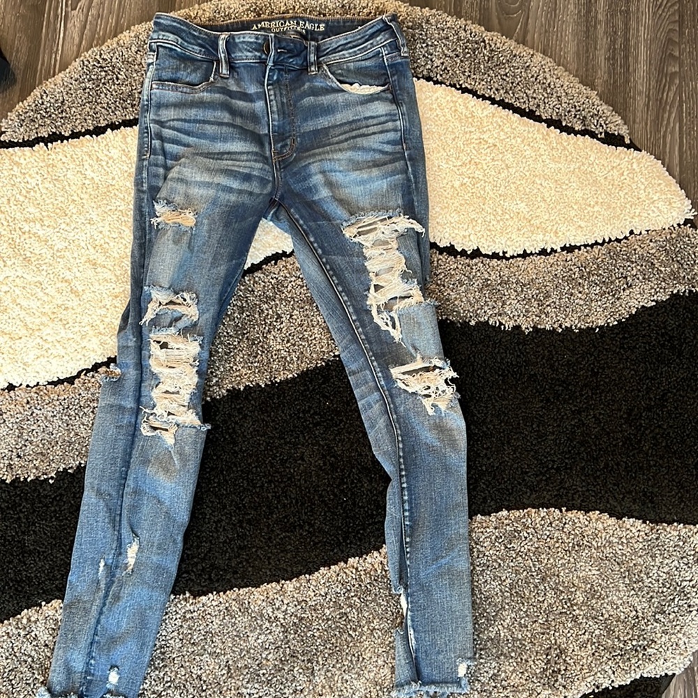 Us 12 regular distressed front and back jeans. High waist , extra stretchy.